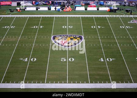 The Baltimore Ravens logo at midfield during the AFC Divisional Playoff game between the Ravens and the Houston Texans at M&T Bank Stadium on January 20, 2024 in Baltimore, Maryland. Stock Photo