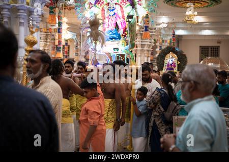Georgetown, Penang, Malaysia - February 05, 2023: Hindus carrying a kavadi float through the Waterfall Hill Temple at Thaipusam festival Stock Photo