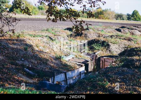 a trench in a field for soldiers. High quality photo Stock Photo