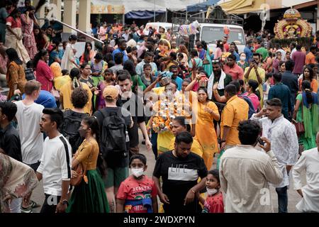Georgetown, Penang, Malaysia - February 05, 2023: Hindu devotees walking through the crowd in front of Arulmigu Sree Ganeshar Temple at the Thaipusam Stock Photo