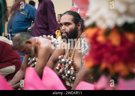 Georgetown, Penang, Malaysia - February 05, 2023: Pierced Hindu devotees resting at the Thaipusam festival Stock Photo