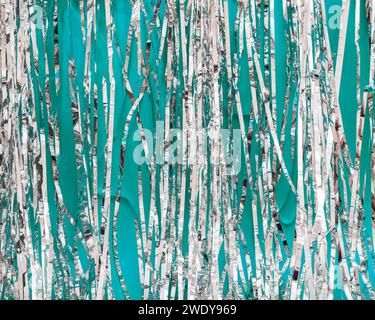 Silver tinsel, metallic glitter decoration sparkling, background Stock Photo