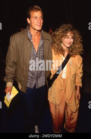 Woody Harrelson And Carol Kane at the Premiere of 'Ruthless People in Century City, California Century City June 24, 1986 Credit: Ralph Dominguez/MediaPunch Stock Photo