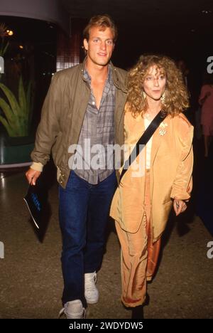 Woody Harrelson And Carol Kane at the Premiere of 'Ruthless People in Century City, California Century City June 24, 1986 Credit: Ralph Dominguez/MediaPunch Stock Photo