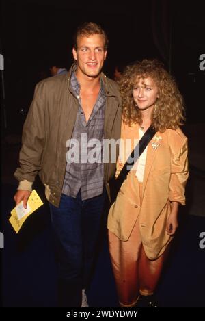 Woody Harrelson And Carol Kane at the Premiere of 'Ruthless People in Century City, California Century City June 24, 1986 Credit: Ralph Dominguez/MediaPunch Stock Photo