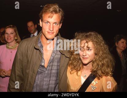 Woody Harrelson And Carol Kane at the Premiere of 'Ruthless People in Century City, California Century City June 24, 1986 Credit: Ralph Dominguez/MediaPunch Stock Photo