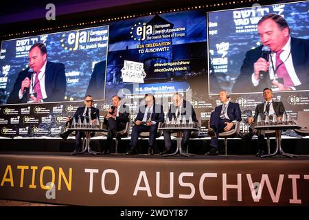 L-R) Alexander Benjamin, EJA Jewish Leaders' Board Vice-Chairman for Advocacy, Stefan Löfven, former Prime Minister of Sweden and President of Party of European Socialists, Roman Kwiatkowski, Chairman of Roma Association in Poland, and Member of The International Auschwitz Council, a translator, Milo ?ukanovi?, former President of Montenegro, Borut Pahor, former President of Slovenia participate in a discussion during the European Jewish Association symposium in the Conference Centre of Hilton hotel in Krakow, Poland ahead of the 79th anniversary of Auschwitz liberation on January 22, 2024. Th Stock Photo