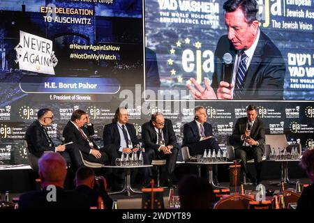 L-R) Alexander Benjamin, EJA Jewish Leaders' Board Vice-Chairman for Advocacy, Stefan Löfven, former Prime Minister of Sweden and President of Party of European Socialists, Roman Kwiatkowski, Chairman of Roma Association in Poland, and Member of The International Auschwitz Council, a translator, Milo ?ukanovi?, former President of Montenegro, Borut Pahor, former President of Slovenia participate in a discussion during the European Jewish Association symposium in the Conference Centre of Hilton hotel in Krakow, Poland ahead of the 79th anniversary of Auschwitz liberationon January 22, 2024. The Stock Photo