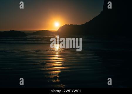 Sunset over the Pacific Ocean at South Seal Point, in Oregon United States of America. Stock Photo