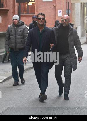 Milan, . 22nd Jan, 2024. 01/22/2024 Milan Ph.Paolo Della Bella Fabrizio Corona after having lunch at the 'Il Salumaio' restaurant in via Montenapoleone, walks with a friend and then gets into the powerful 'Bentley' parked on the pavement under a no-parking permit. Credit: Independent Photo Agency/Alamy Live News Stock Photo