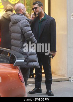 Milan, . 22nd Jan, 2024. 01/22/2024 Milan Ph.Paolo Della Bella Fabrizio Corona after having lunch at the 'Il Salumaio' restaurant in via Montenapoleone, walks with a friend and then gets into the powerful 'Bentley' parked on the pavement under a no-parking permit. Credit: Independent Photo Agency/Alamy Live News Stock Photo