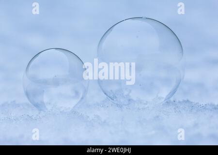 The Bubbles in the snow developing the tiniest crystallisation as they start to freeze Stock Photo