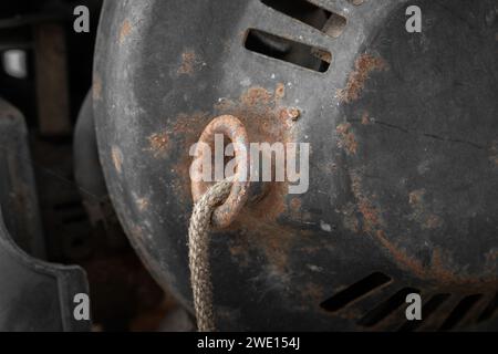 Close up look of an old power generator. Old yellow fuel back up generator. Stock Photo