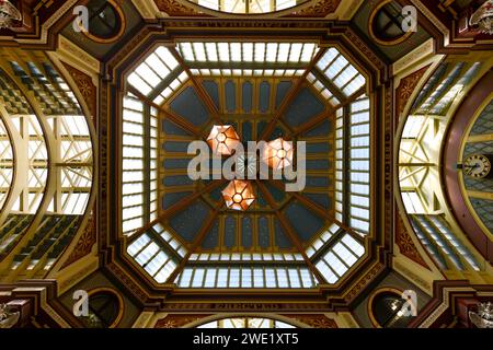 London, UK - Aug 26, 2022:  Iconic painted roof of the Leadenhall market. Built in 1881. There are many bars restaurants and shops. Famous tourist sig Stock Photo