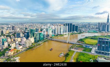 Aerial view of cable-stayed Ba Son bridge connecting traffic to commercial center across  Saigon River in Ho Chi Minh City, Vietnam Stock Photo