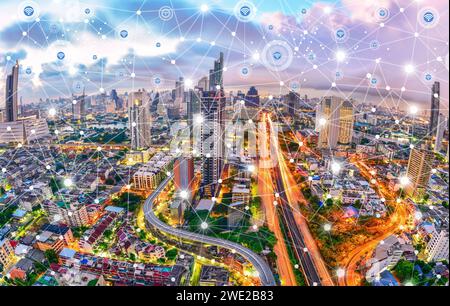 Modern city at twilight with network connection wireless communication concept Stock Photo