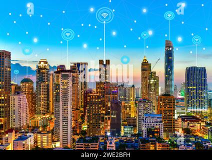 Modern city at twilight with network connection wireless communication concept Stock Photo