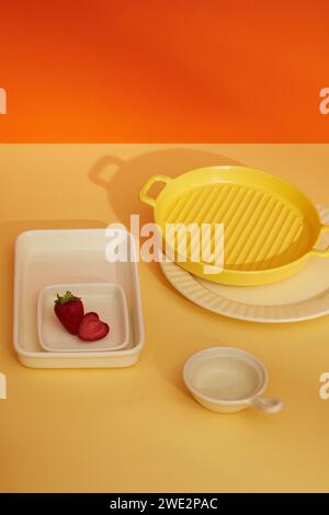 Multicolored porcelain plates decorated on color background. Abstract scene with minimalist style for product brand presentation, copy space Stock Photo