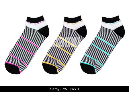 Socks with different lines isolated on white background. Colorful socks son white background. Colored socks on the leg isolated on white background Stock Photo