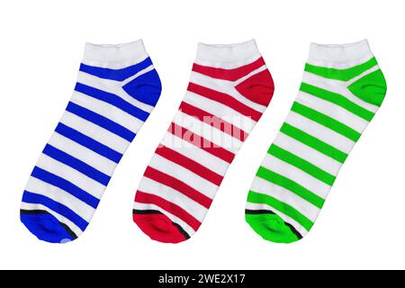 Socks with different lines isolated on white background. Colorful socks son white background. Colored socks on the leg isolated on white background Stock Photo