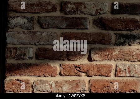 Brick wall orange red can be used as wallpaper or background. beutifrl soft light. 2024 stock trend. Stock Photo