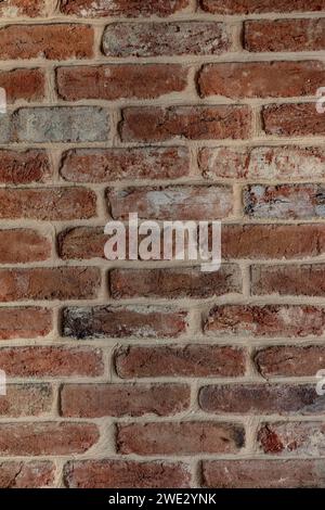 Brick wall orange red can be used as wallpaper or background. beutifrl soft light. 2024 stock trend. Stock Photo