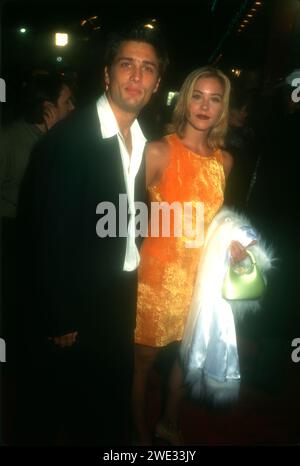 Los Angeles, California, USA 12th December 1996 Actor Louie Sabatasso and Actress Christina Applegate attend Warner Bros. Tim BurtonÕs Mars Attacks Premiere at MannÕs Chinese Theatre on December 12, 1996 in Los Angeles, California, USA. Photo by Barry King/Alamy Stock Photo Stock Photo