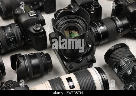 Modern cameras on gray marble table, flat lay Stock Photo - Alamy