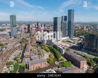 Aerial photograph of Castlefield, Manchester, UK with Deansgate Square, Beetham Tower & the wider city centre in the background. Taken on a sunny day Stock Photo