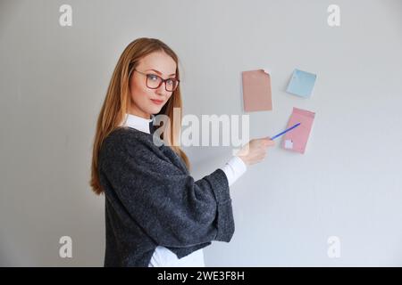 girl manager or teacher makes a presentation Stock Photo