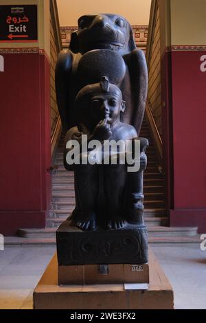 Cairo, Egypt - January 2, 2024: Statue of young Ramses II and God Horus at The Egyptian Museum Stock Photo