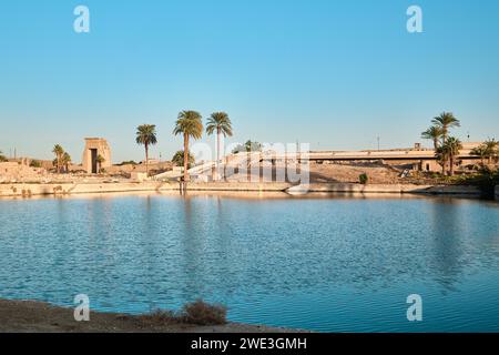 Luxor, Egypt - December 26 2023: Karnak Temple Complex, the Sacred Lake of Precinct of Amun-Re, Ruins of ancient Egyptian civilization Stock Photo