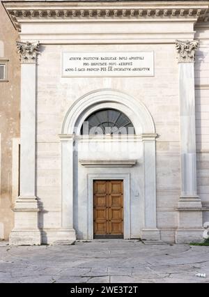 Side door to the papal basilica of St Paul outside the walls, Rome, Italy. Stock Photo