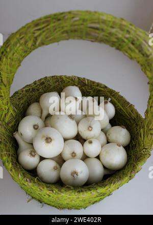 Homemade Straw Basket Filled With Fresh White Onion Top View Stock Photo