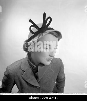 In the 1950s. Portrait of a woman wearing a fashionable hat with a decor. 1950. ref i818 Stock Photo