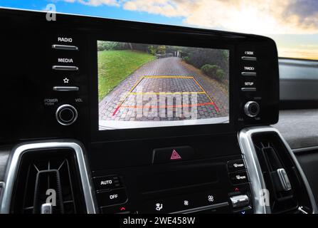 Rear view monitor for reversing system Car display and rear view camera parking assistant car navigation. Car rear view system monitor reverse video c Stock Photo