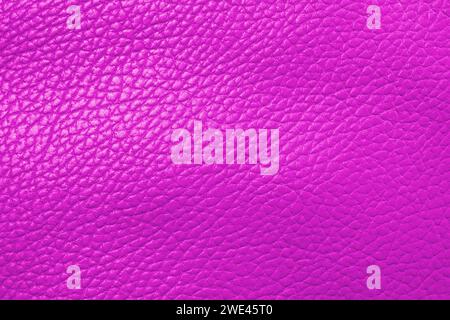 Macro shot pink leather texture background.. Part of perforated leather details. Pink perforated leather texture background. Texture, artificial leath Stock Photo