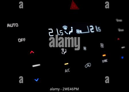 Air conditioning touch buttons inside a modern car. Climate control AC unit in the new car. Modern car interior details. Car inside interior Stock Photo