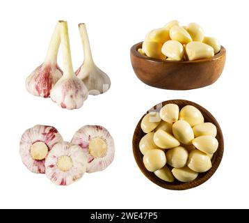 Garlic cloves and young heads of garlic. Garlic Isolated on white background Clipping Path. Garlic cloves isolated on white background. Top view. Garl Stock Photo
