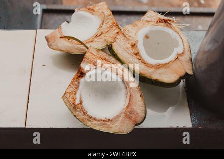 green coconuts cut in half Stock Photo