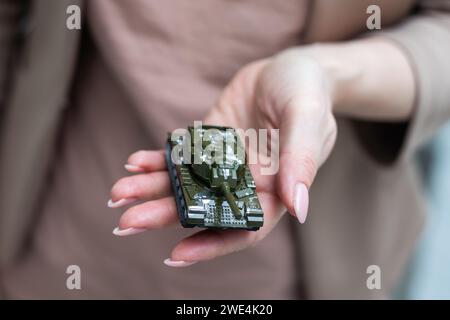 green tank model in hand Stock Photo