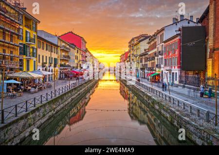 Naviglio Canal, Milan, Lombardy, Italy with a dramatic golden hour sky. Stock Photo