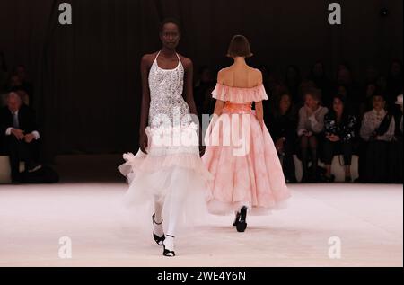 Paris, France. 23rd Jan, 2024. Models present creations from the haute-couture spring/summer 2024 collections by French fashion house Chanel during the Paris Fashion Week, in Paris, France, on Jan. 23, 2024. Credit: Gao Jing/Xinhua/Alamy Live News Stock Photo