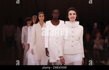 Paris, France. 23rd Jan, 2024. Models present creations from the haute-couture spring/summer 2024 collections by French fashion house Chanel during the Paris Fashion Week, in Paris, France, on Jan. 23, 2024. Credit: Gao Jing/Xinhua/Alamy Live News Stock Photo