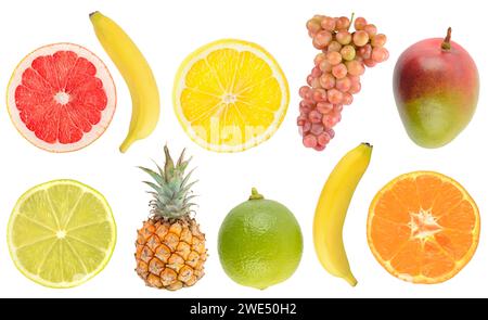 Fresh tropical fruits whole and cut in half isolated on white background. Stock Photo