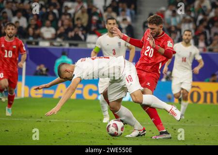 Al Rayyan, Qatar. 14th Jan, 2024. Zaid Qunbar of Palestine and Saeid ...