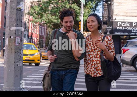 Past Lives (2023) directed by Celine Song and starring Greta Lee, Teo Yoo and John Magaro. Nora and Hae Sung, two deeply connected childhood friends, are wrested apart after Nora's family emigrates from South Korea. Twenty years later, they are reunited for one fateful week as they confront notions of love and destiny. Publicity photograph ***EDITORIAL USE ONLY***. Credit: BFA / Jon Pack / A24 Stock Photo
