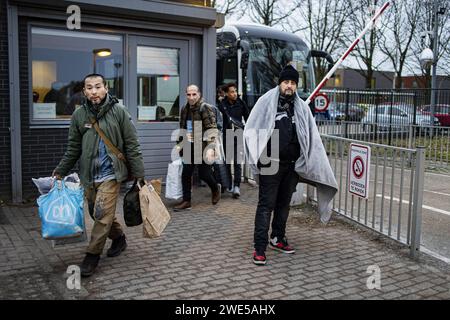 TER APEL - Refugees arrive at the registration center in Ter Apel. The registration center in Ter Apel, where all new asylum seekers must register, has been receiving many more people than the 2,000 agreed with the government. ANP RAMON VAN FLYMEN netherlands out - belgium out Stock Photo