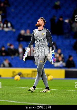 Jose Sa of Wolves warms up and looks to the skies during the Premier League match between Brighton and Hove Albion and Wolverhampton Wanderers at the American Express Stadium  , Brighton , UK - 22nd January 2024 Photo Simon Dack / Telephoto Images. Editorial use only. No merchandising. For Football images FA and Premier League restrictions apply inc. no internet/mobile usage without FAPL license - for details contact Football Dataco Stock Photo