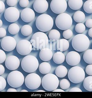 White Spheres in different sizes with a rough surface on a blue plane. Seamlessly tileable image. Stock Photo
